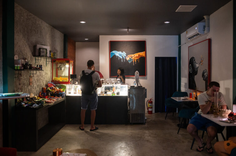 The lounge in the evening with guests and art